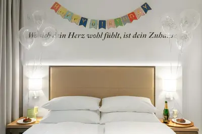 Ein Bett oder Betten in einem Zimmer der Unterkunft HighPark Berlin am Potsdamer Platz