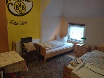 Ein Bett oder Betten in einem Zimmer der Unterkunft Mein Marienhof