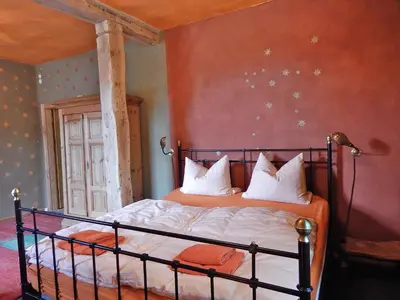 Ein Bett oder Betten in einem Zimmer der Unterkunft Kornspeicher Himmelpfort
