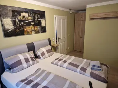 Ein Bett oder Betten in einem Zimmer der Unterkunft Ferienwohnung Teltow 2