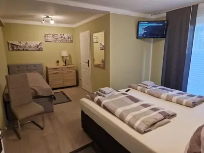 Ein Bett oder Betten in einem Zimmer der Unterkunft Ferienwohnung Teltow 2
