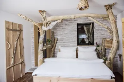 Ein Bett oder Betten in einem Zimmer der Unterkunft Sonnenhof - Gasthaus Görsdorf
