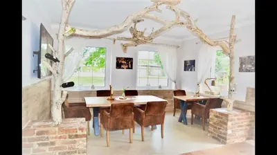 Ein Sitzbereich in der Unterkunft Sonnenhof - Gasthaus Görsdorf