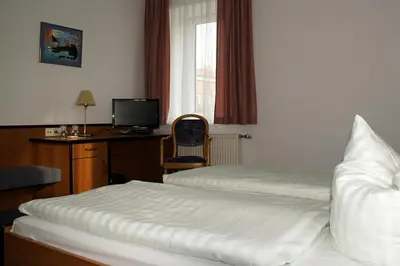 Ein Bett oder Betten in einem Zimmer der Unterkunft Landhotel Pagram-Frankfurt/Oder