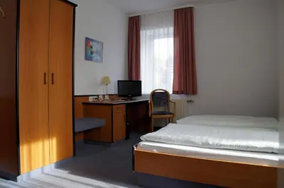 Ein Bett oder Betten in einem Zimmer der Unterkunft Landhotel Pagram-Frankfurt/Oder