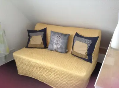 Ein Bett oder Betten in einem Zimmer der Unterkunft Eulennest Oranienburg