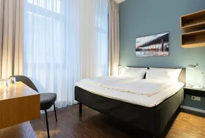 Ein Bett oder Betten in einem Zimmer der Unterkunft Hotel Johann