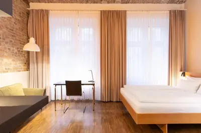 Ein Bett oder Betten in einem Zimmer der Unterkunft Hotel Johann