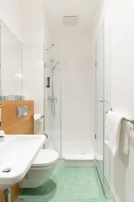 Ein Badezimmer in der Unterkunft Hotel Johann