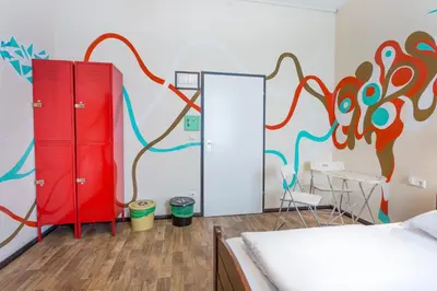 Ein Bett oder Betten in einem Zimmer der Unterkunft Sunflower Hostel Berlin