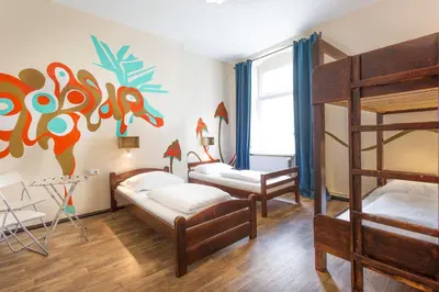 Ein Bett oder Betten in einem Zimmer der Unterkunft Sunflower Hostel Berlin