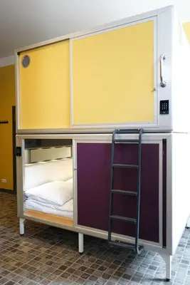 Ein Bett oder Betten in einem Zimmer der Unterkunft Sunflower Hostel Berlin