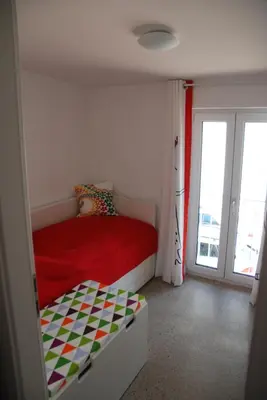 Ein Bett oder Betten in einem Zimmer der Unterkunft Remise am Schlosspark