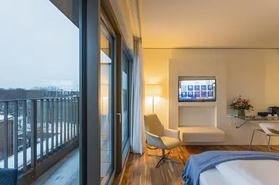 Ein Bett oder Betten in einem Zimmer der Unterkunft Pestana Berlin Tiergarten