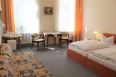 Ein Bett oder Betten in einem Zimmer der Unterkunft Pension Brinn