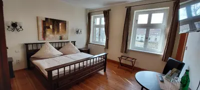 Ein Bett oder Betten in einem Zimmer der Unterkunft Landgasthof Rieben