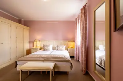 Ein Bett oder Betten in einem Zimmer der Unterkunft Café Wildau Hotel & Restaurant am Werbellinsee