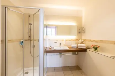 Ein Badezimmer in der Unterkunft Café Wildau Hotel & Restaurant am Werbellinsee