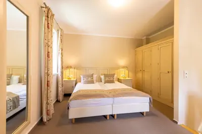 Ein Bett oder Betten in einem Zimmer der Unterkunft Café Wildau Hotel & Restaurant am Werbellinsee