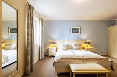 Ein Bett oder Betten in einem Zimmer der Unterkunft Café Wildau Hotel & Restaurant am Werbellinsee