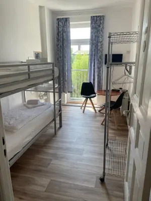 Ein Bett oder Betten in einem Zimmer der Unterkunft Hotel-Pension Adamshof