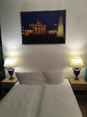 Ein Bett oder Betten in einem Zimmer der Unterkunft Hotel-Pension Adamshof