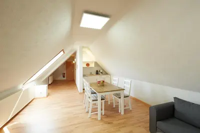 Ein Sitzbereich in der Unterkunft Hotel garni 