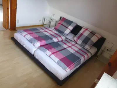 Ein Bett oder Betten in einem Zimmer der Unterkunft Ferienwohnung Schorfheide