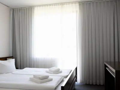 Ein Bett oder Betten in einem Zimmer der Unterkunft DAS SCHMÖCKWITZ