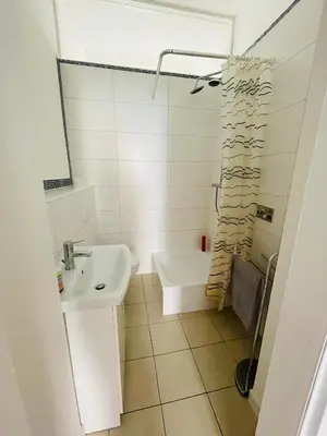 Ein Badezimmer in der Unterkunft Nice City Apartment