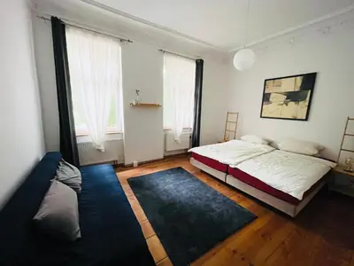 Ein Bett oder Betten in einem Zimmer der Unterkunft Nice City Apartment