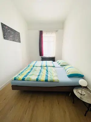 Ein Bett oder Betten in einem Zimmer der Unterkunft Zentrale ruhige Ferienwohnung in Berlin