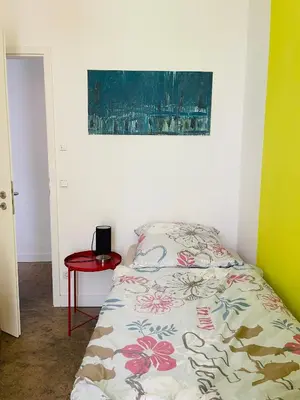Ein Bett oder Betten in einem Zimmer der Unterkunft Zentrale ruhige Ferienwohnung in Berlin