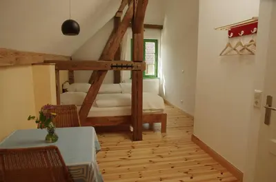 Ein Bett oder Betten in einem Zimmer der Unterkunft Stützpunkt Trebitz - Gästezimmer am Europaradweg R1