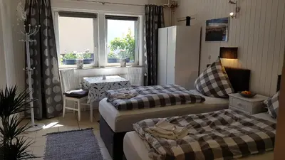Ein Bett oder Betten in einem Zimmer der Unterkunft Zimmer am Schwielowsee