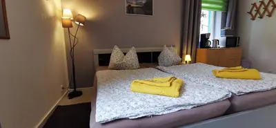 Ein Bett oder Betten in einem Zimmer der Unterkunft Zimmer am Schwielowsee