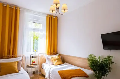Ein Bett oder Betten in einem Zimmer der Unterkunft Ferienwohnung Gründerhaus