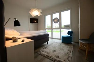 Ein Bett oder Betten in einem Zimmer der Unterkunft Luxstay Werder