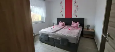 Ein Bett oder Betten in einem Zimmer der Unterkunft Spreewälder Ferienpension
