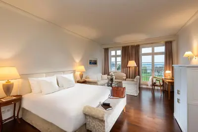 Ein Bett oder Betten in einem Zimmer der Unterkunft Sunday Resort Schwielowsee - Hotel