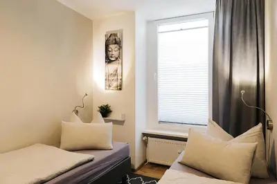 Ein Bett oder Betten in einem Zimmer der Unterkunft 2 Zimmer Apartment Charlottchen