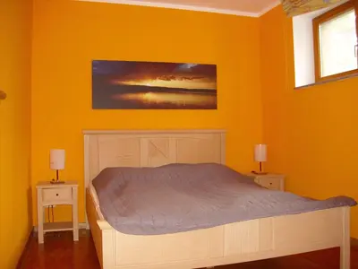 Ein Bett oder Betten in einem Zimmer der Unterkunft Fewoamglubigsee