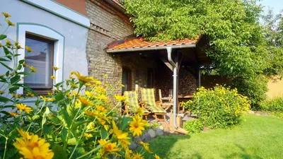 Ein Garten an der Unterkunft JANISCHs Fewo im Spreewald, Terrasse, großer Garten und Blick inklusive