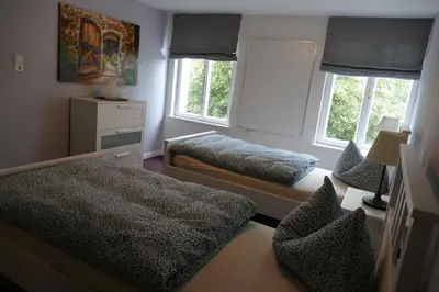 Ein Bett oder Betten in einem Zimmer der Unterkunft Ferienwohnung am Markt