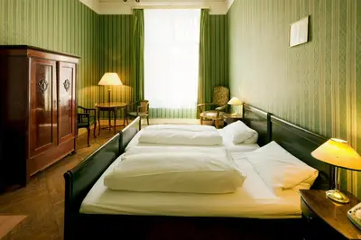 Ein Bett oder Betten in einem Zimmer der Unterkunft Hotel-Pension Funk am Kurfürstendamm