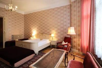 Ein Bett oder Betten in einem Zimmer der Unterkunft Hotel-Pension Funk am Kurfürstendamm