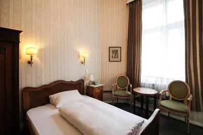 Ein Bett oder Betten in einem Zimmer der Unterkunft Hotel-Pension Funk am Kurfürstendamm