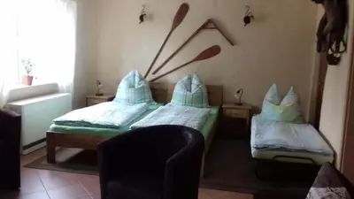 Ein Bett oder Betten in einem Zimmer der Unterkunft Ferienwohnung Wildau-Wentdorf