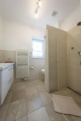 Ein Badezimmer in der Unterkunft Ferienwohnungen Schön