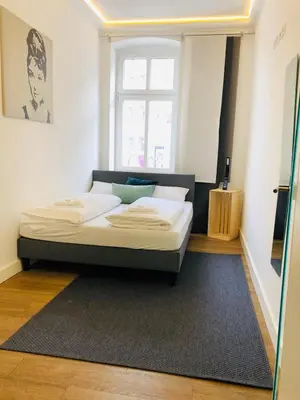 Ein Bett oder Betten in einem Zimmer der Unterkunft Jaspers Boutique Rooms